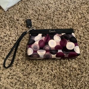 Coach multi colored wristlet.